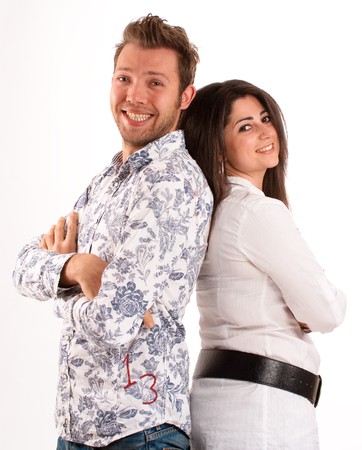 
Young couple back to back smiling at the camera .
の写真素材