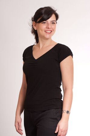 
Portrait of an smiling attractive green eyed  brunette  dressed in black
の写真素材