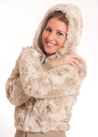 
Cute cold girl with a fury winter outfit and the hood on
の写真素材