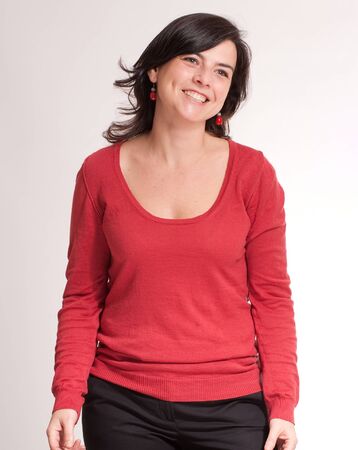 
Portrait of a cheerful brunette dressed in red
の写真素材