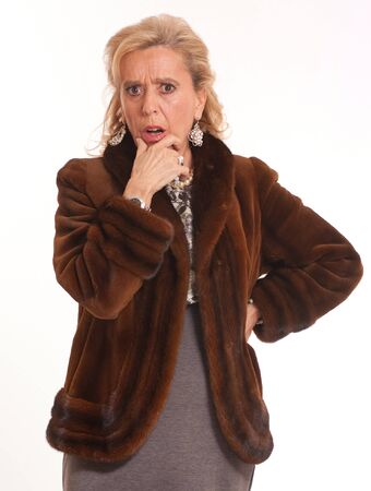 
Portrait of a horrified elegant senior lady in a mink coat
の写真素材