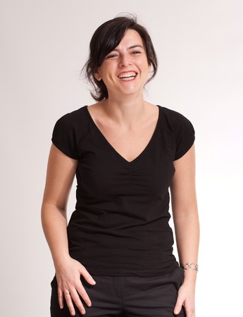 
Portrait of a laughing attractive green eyed  brunette  dressed in black
の写真素材