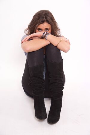 
Portrait of a sad girl sting on the floor
の写真素材