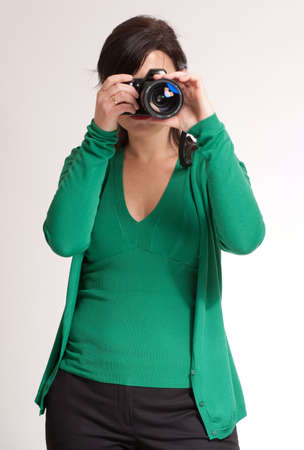 
Portrait of an attractive brunette holding a photographic camera
の写真素材