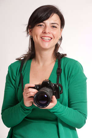 
Portrait of an attractive brunette holding a photographic camera
の写真素材