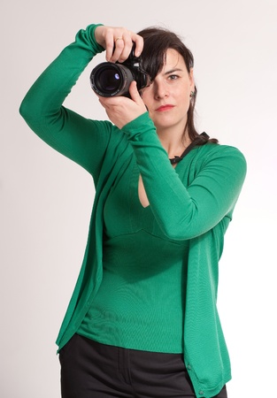 
Portrait of an attractive brunette holding a photographic camera
の写真素材