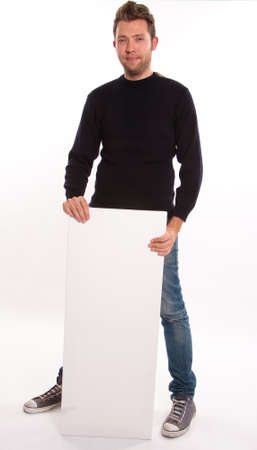 
Young Man holding a vertical message board
の写真素材