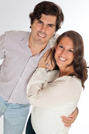

Smiling happy Young couple against a white background
の写真素材