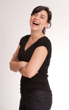 
Portrait of a laughing attractive green eyed  brunette  dressed in black
の写真素材