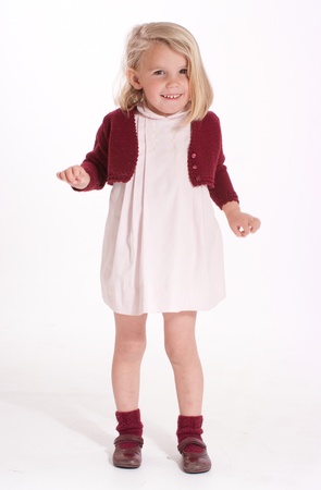 
Smiling cute little blonde girl in a smart dress
の写真素材