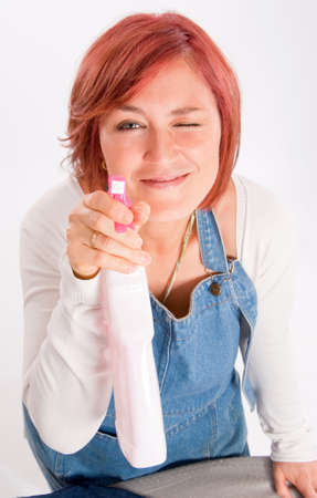 


Woman with apron leaning on an ironing board and  playing with  the ironing spray

の写真素材