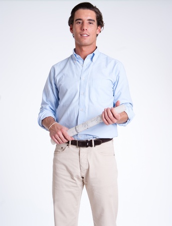 
Portrait of a young man holding a roll of blueprints
の写真素材