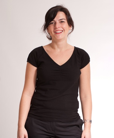 
Portrait of an smiling attractive green eyed  brunette  dressed in black
の写真素材