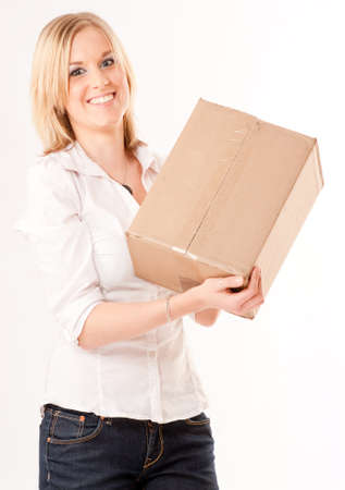 
Blonde young  woman holding a cardboard package
の写真素材