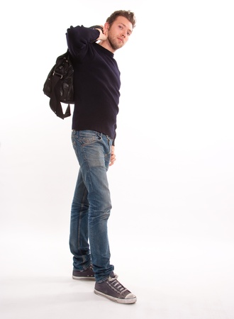 
Young man casually dressed holding a leather bag
の写真素材