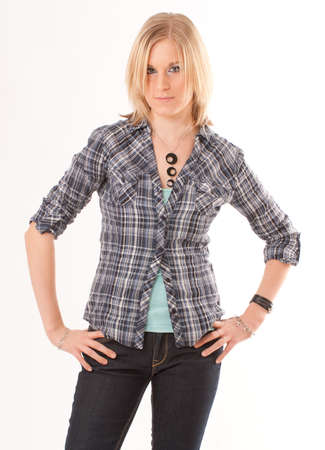 
Serious, staring young blonde girl with hands on hips

の写真素材