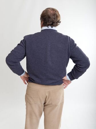 
Rear view of a man with his hands on his hips

の写真素材