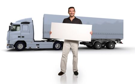 A man holding a blank message board with a big truck on the backgroundの写真素材