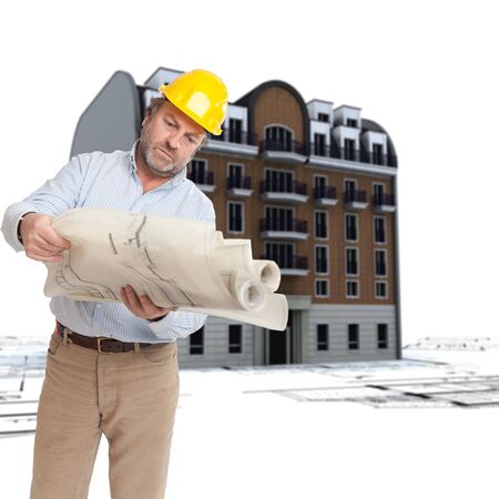 
An architect, blueprints and an old classical urban building on the background
の写真素材