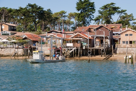 Old fishermen cabins on stilts transformed into vacation homesの写真素材