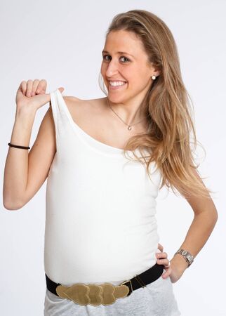 Happy woman in her early stages of pregnancyの写真素材