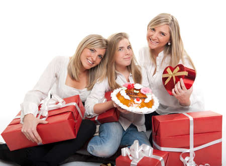 

Three sisters in her teens with an anniversary cake and lots of presents

の写真素材