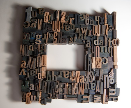 Background of vintage wooden print letter cases in a frame shapeの写真素材