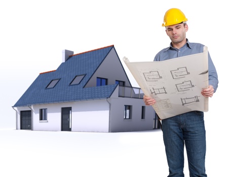 Architect with blueprints and a residential architecture modelの写真素材