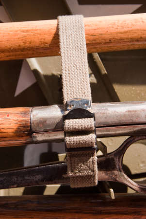 Strapped tools in a compartment on a vintage US army vehicle