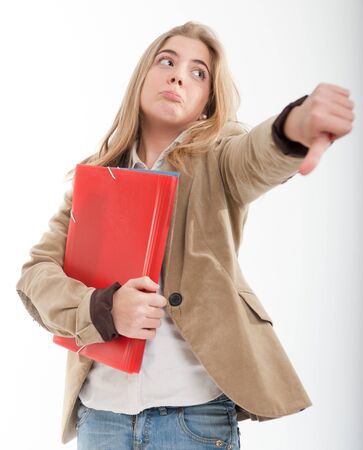 
Serious female teenager with her thumb down

の写真素材
