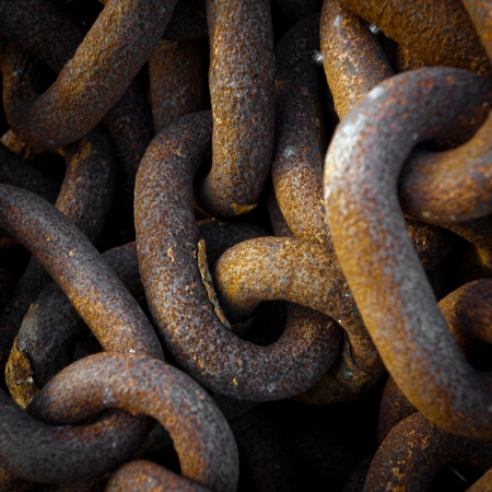 Close-up shot on rusty old chainsの写真素材