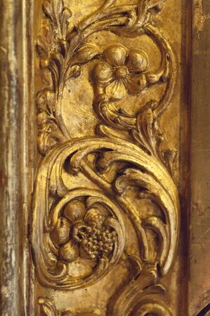 Close up shot on a gilded ancient frameの写真素材