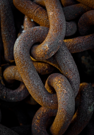 Close-up shot on rusty old chainsの写真素材