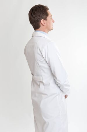 
Profile of a man on lab coat 
の写真素材