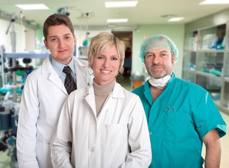 Smiling medical team in an operating roomの写真素材