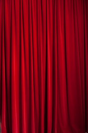 Red curtain ideal for backgrounds and texturesの写真素材