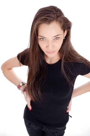 Portrait of an attractive brunette hands on hipsの写真素材