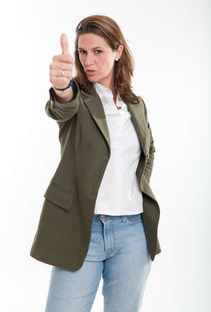 Woman in business casual with her thumb upの写真素材