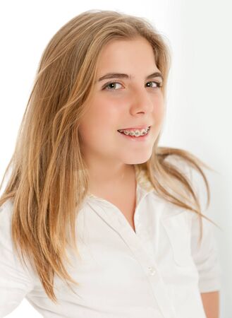 
Young blonde teenager with braces smiling to the camera
の写真素材