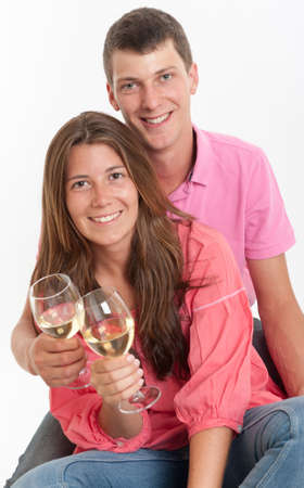 Young couple drinking white wineの写真素材