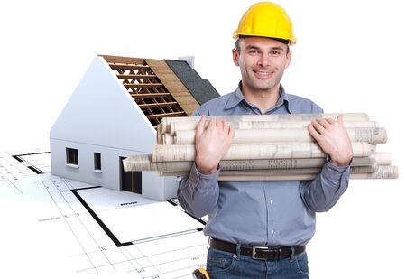 
Young architect holding lots of blueprints with a house on construction at the background
の写真素材