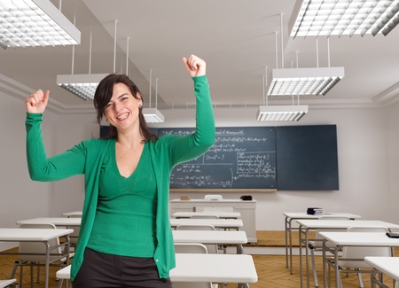 
Happy celebrating brunette posing in a maths class
の写真素材