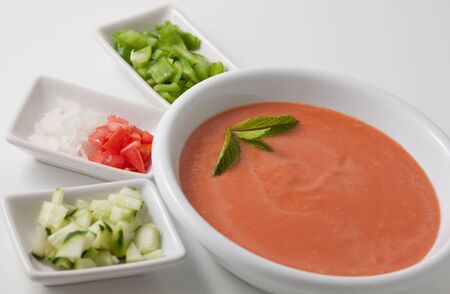 Gazpacho soup with side dishesの写真素材