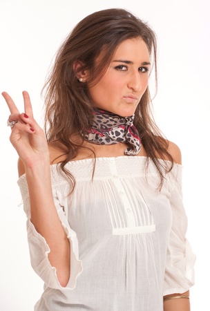 
Young attractive brunette sticking out two fingers
の写真素材