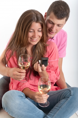 Engagement scene with young coupleの写真素材