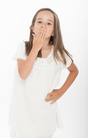 Little girl sending a kiss with her hand の写真素材