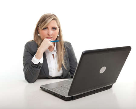 
Young businesswoman, at her desk with a serious expression
の写真素材