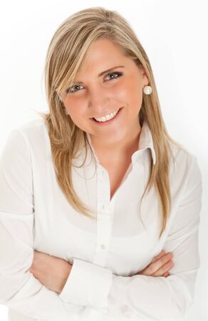 
Portrait of an smiling pretty young blond woman in a white shirt
の写真素材