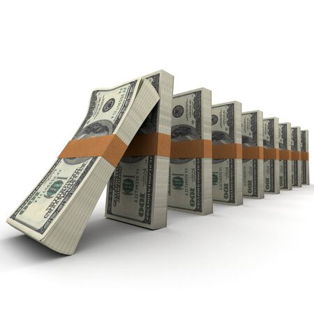 Domino effect with stacks of hundred dollar billsの写真素材