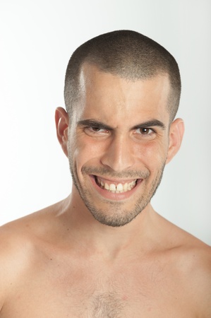 Portrait of an expressive young manの写真素材